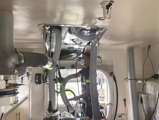 Ashland Air Duct Cleaning specialist performing precise mobile home duct cleaning in Ashland