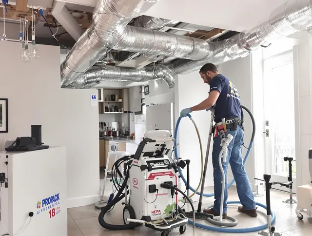 Ashland Air Duct Cleaning technician performing advanced pure duct cleaning with specialized equipment in Ashland